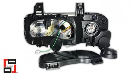 9738202861 Фара головного світла L MB ATEGO II 2004- (гладке скло) TANGDE TD01-50-017L